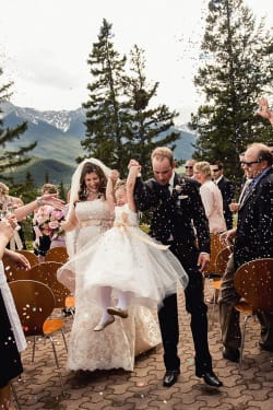 Bride And Groom Recessional Swinging Flower Girl With Confetti