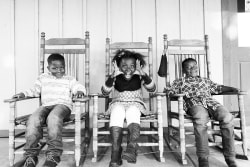 Three Siblings Making Silly Faces Grapevine Rocking Chairs